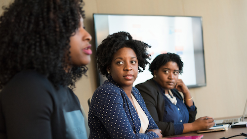 Women at a conference meeting