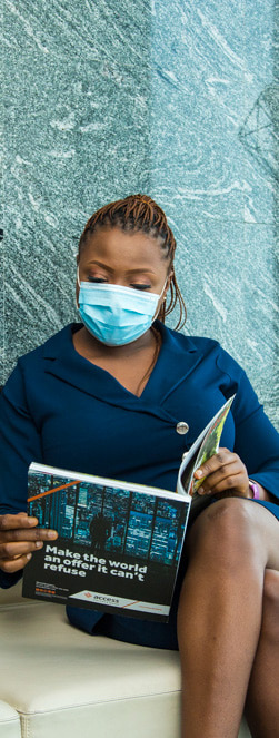 Access Bank Staff reading magazine